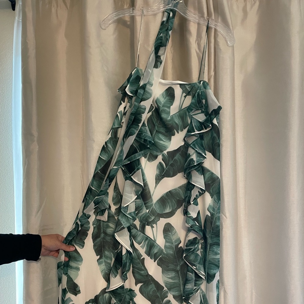 A noodle strap dress, brand new with a tag.